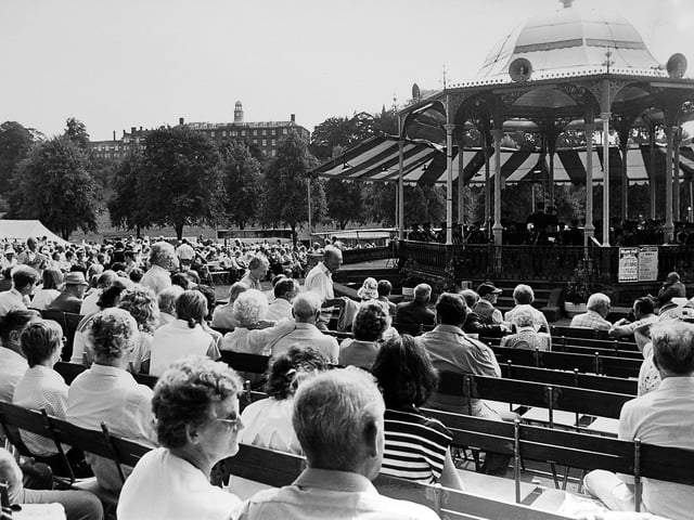 Crowds gather around the bandstand in The Quarry during Shrewsbury Flower Show in 1984.