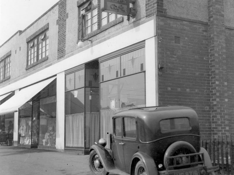 Dewsbury Road in December 1938. View of cafe and shops premises of Jack Kirkby with Harry Boland draper next door at 394.