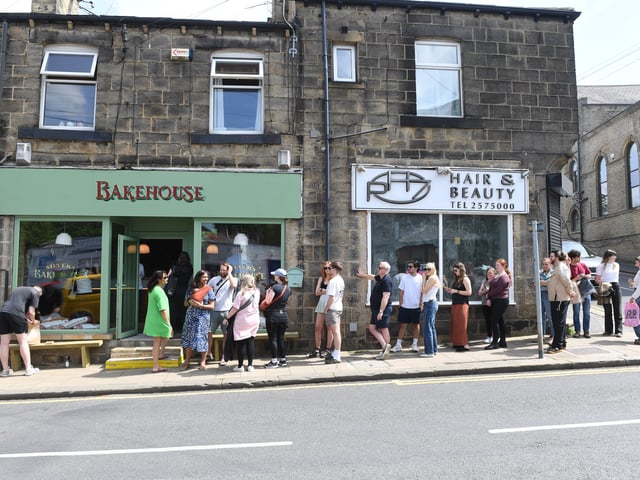 Queues at the opening of the new shop in Farsley's Town Street.