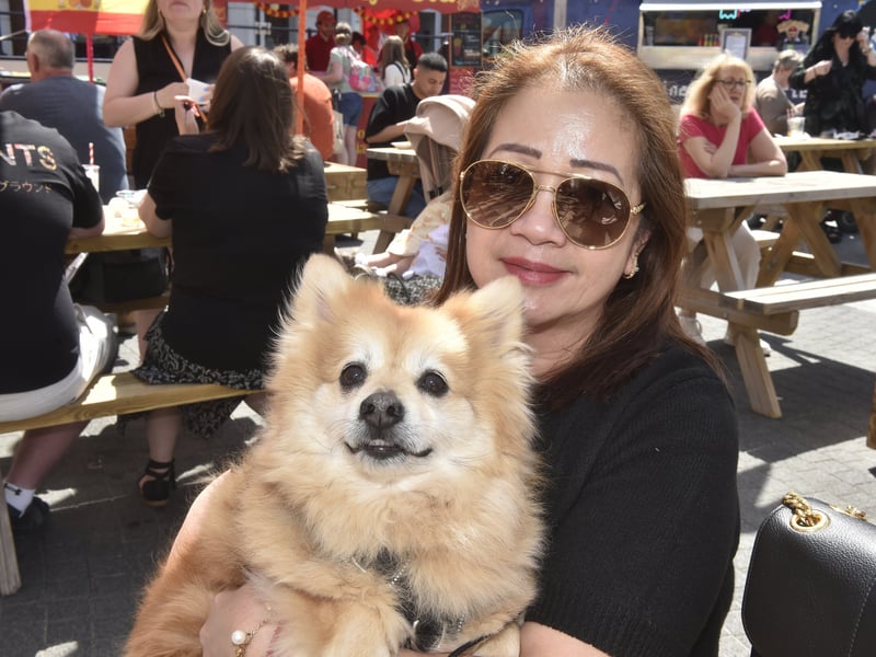 Moonyth Damasco with her Pomeranian called Chia.
