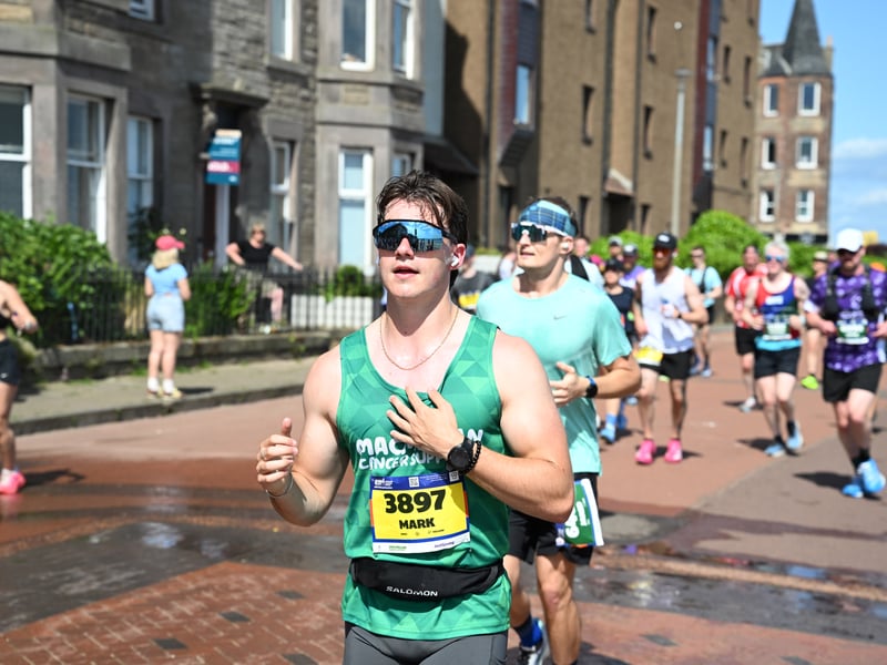 Locals came out of their homes along the route to support the runners.