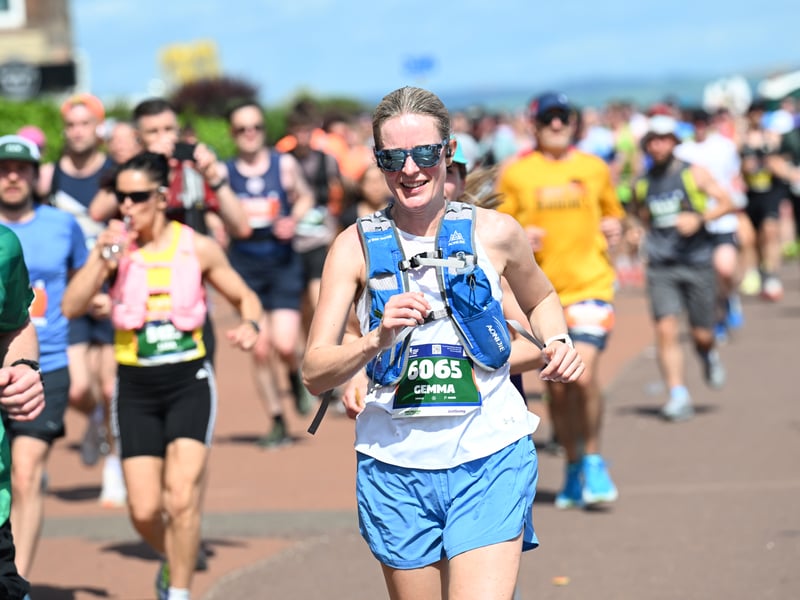 Many of the runners were prepared for the warm sunshine, wearing sunglasses and carrying water.