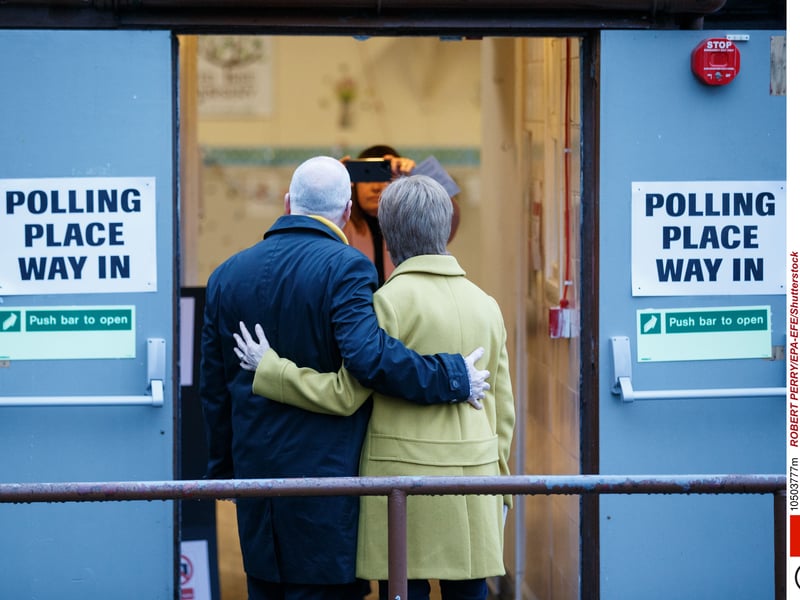 SNP leader Nicola Sturgeon arrives to cast her vote with her husband Peter Murrell during the 2019 General Election at Broomhouse Community Hall polling station, in Glasgow.