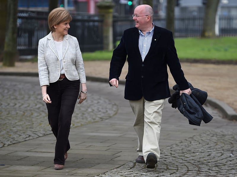 First Minister Nicola Sturgeon and her husband Peter Murrell join SNP Westminster candidates and activists to launch the Glasgow central campaign in the UK General Election on February 14, 2015.