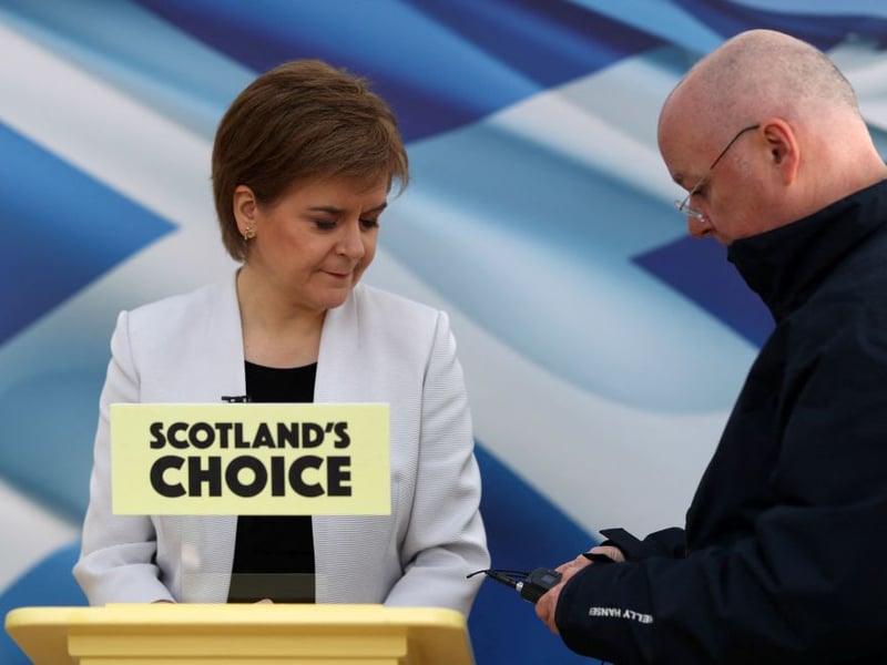 Scotland's First Minister and leader of the Scottish National Party, Nicola Sturgeon, and her husband Peter Murrell attend a rehearsal of her SNP Campaign Conference speech in Glasgow in March 2021.