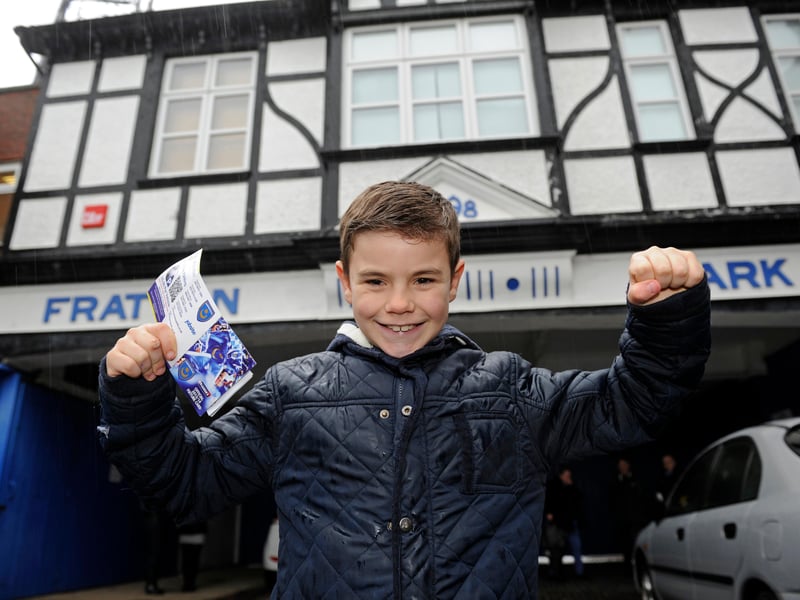 Eight-year-old Alfie Blagden gets his hand on a season ticket in 2014.