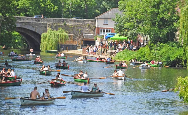 Visitors to Knaresborough enjoy a row on the River Nidd