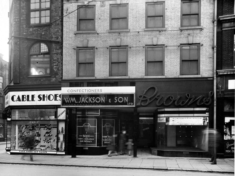 A view of nos. 126, 127 and 127A on Kirkgate, Cable Shoes, W. Jackson and Son Ltd. confectioners, Brown's footwear (closing down). Pictured in November 1943.