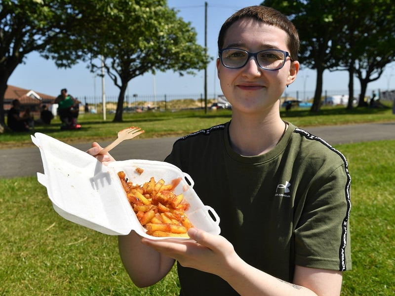 Jack Williams enjoys some chips at the Great North Feast in the Park.