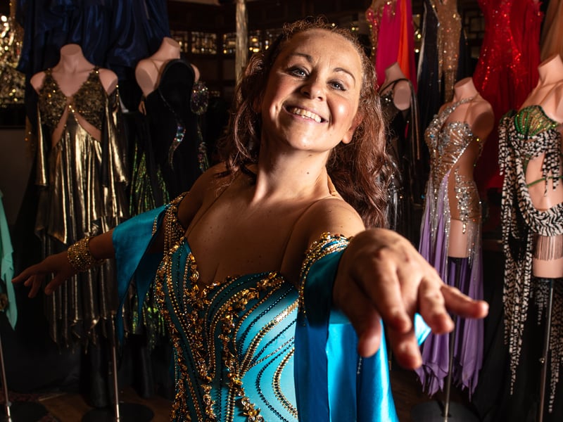 Local dancer Lucie Dorrans tries on a ballgown and goes for a look inside Blackpool Dance Festival, as she prepares for her 'All Stars' Dance Floor Heroes fundraising journey. Photo: Lucinda Herbert