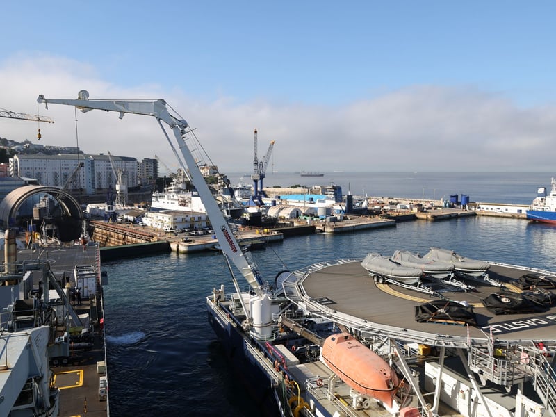 HMS Stirling Castle cranes on equipment to RFA Lyme Bay in Gibraltar. The Bay-Class auxiliary ship is in Gibraltar undergoing maintenance and loading vital kit for further operations.