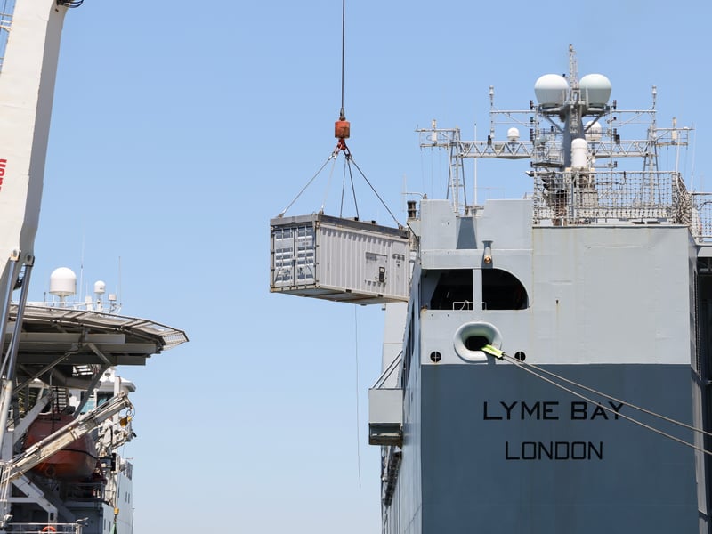 HMS Stirling Castle cranes on equipment to RFA Lyme Bay in Gibraltar.