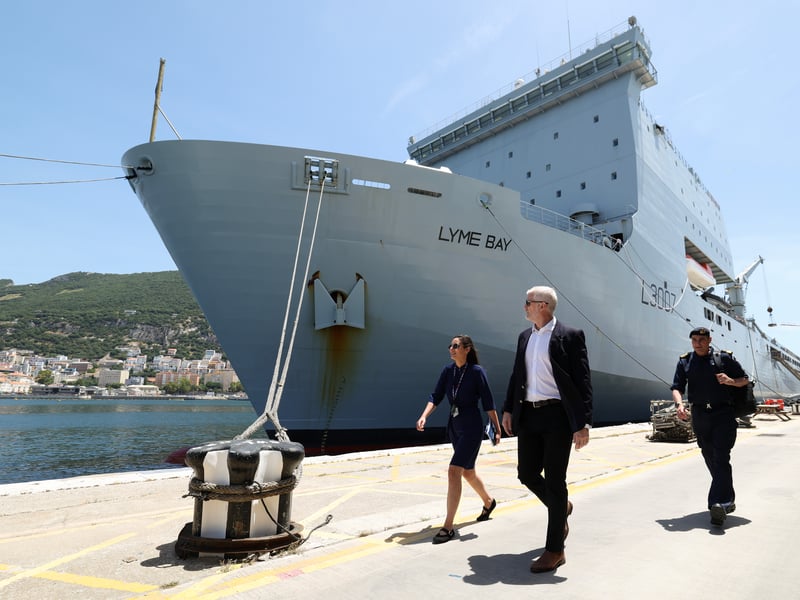 Minister of Armed Forces Alistair Carns DSO OBE MC MP leaves RFA Lyme Bay to visit HMS Stirling Castle.