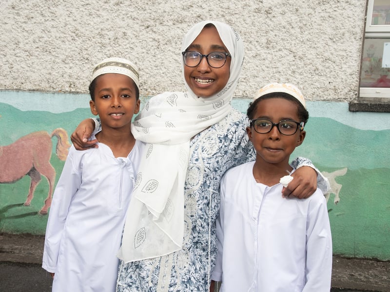 Siblings Mogtaba, Hala and Momzir at Cultural Diversity Day at Castlebar Primary School.