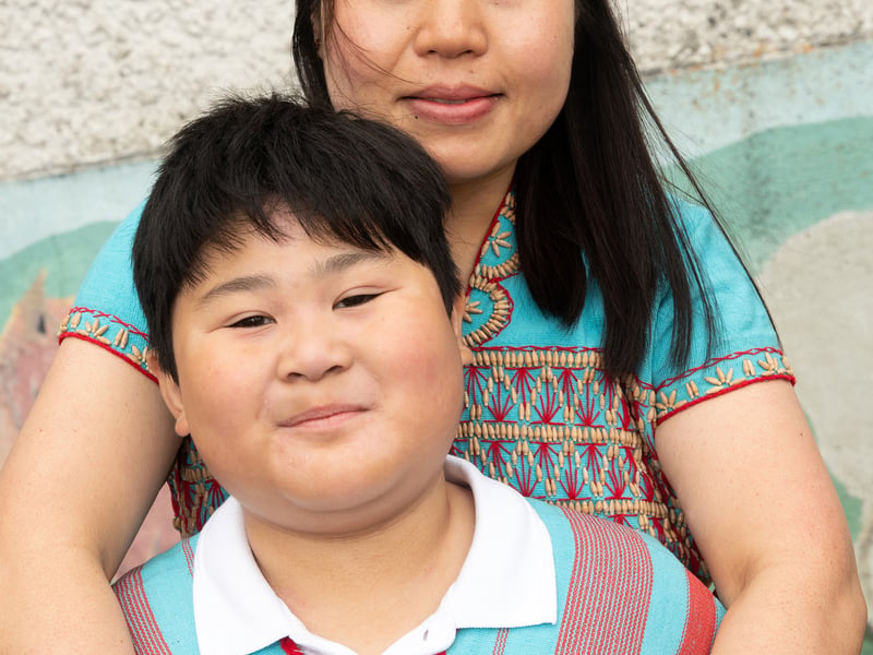 Hsar Bnay Say with her son Nathaniel Lay at Cultural Diversity Day at Castlebar Primary School.