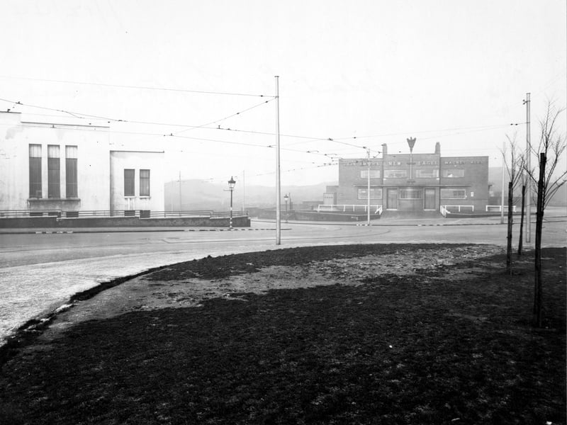 Lupton Avenue in December 1944. A view across island site towards New Eagle Hotel and Ambulance Station.