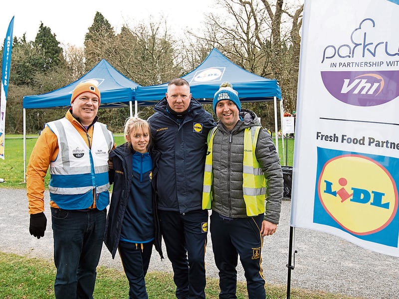 Colm McNerney, Lidl representatives Aria Rose and John Swift, and the Longfrd parkrun director Kevin Kane