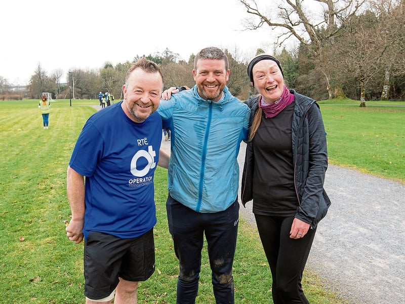Thomas Hynes alongside his brother James Hynes, and Teresa Blake. It was Teresa's 202nd parkrun. She loves parkrun, especially the social aspect of it