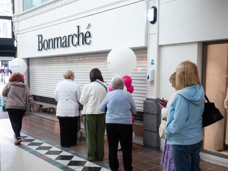 A queue forms at Bonamrche before the shutters even open