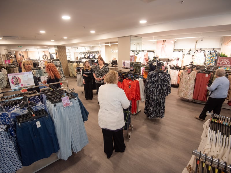Customers browse Bonmarche 's offering