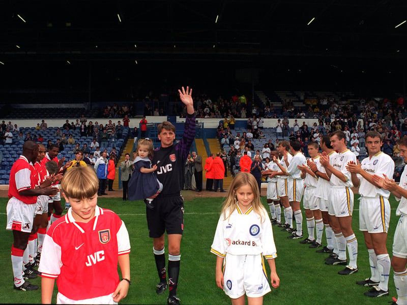 John Lukic walks out with daughters Zoe, 2, Amy, 9, and son John, 10. 