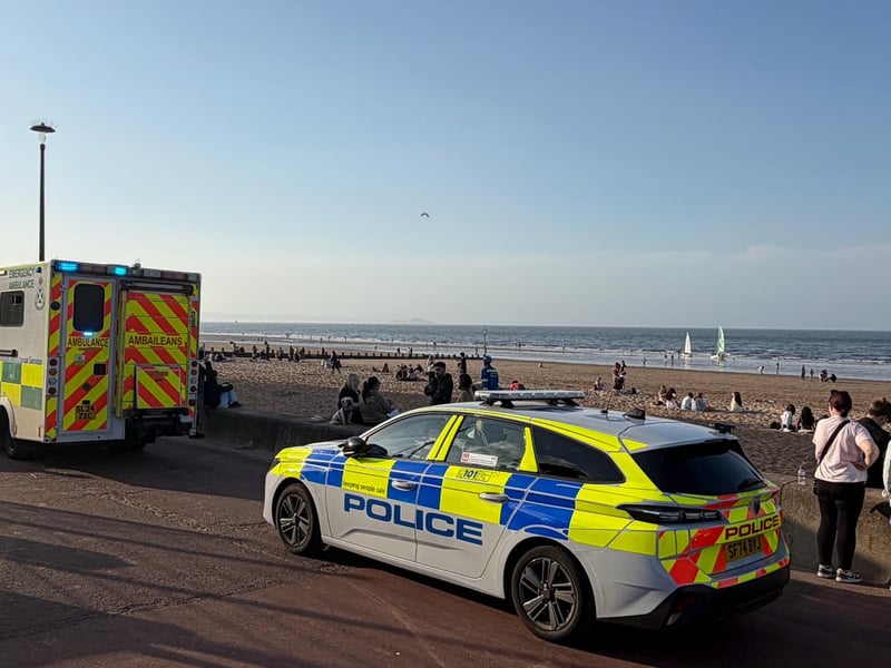 Another view of police and ambulance at Portobello Promenade.