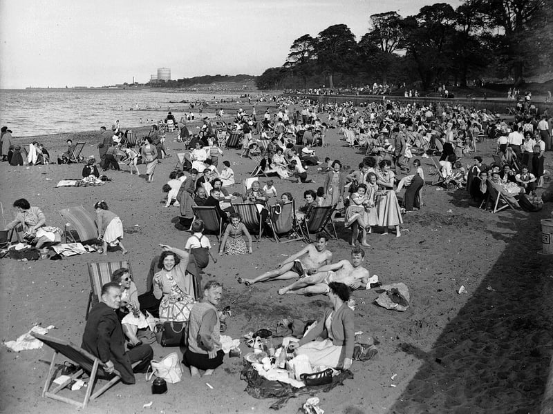Holidaymakers at Cramond Beach in Edinburgh in July 1955.
