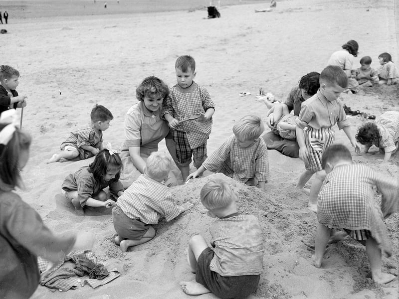 Niddrie Day Nursery children enjoying an outing to Gullane Beach in July 1959.