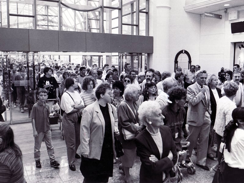 Shoppers pour into Meadowhall on its opening day, September 4, 1990