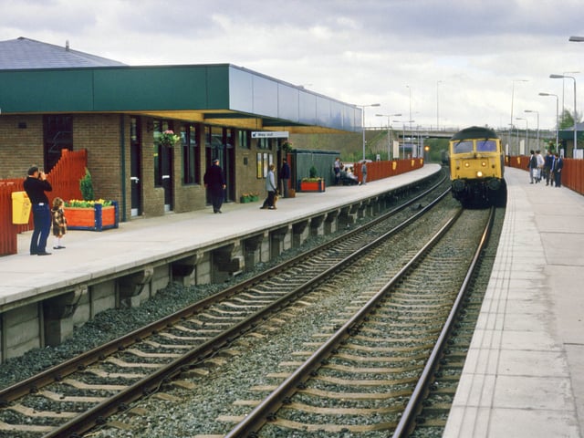 Telford Central railway station on its opening day, 12 May 1986, captures a landmark moment in the town’s modern history as passengers and rail enthusiasts gather to witness the arrival of the first down revamped Cambrian Coast Express from Euston to Aberystwyth. This image, shared by Geoff Cryer of the Telford Railway Society, recalls the return of a celebrated route name last used in 1967, when the original Cambrian Coast Express ceased running as a through service.