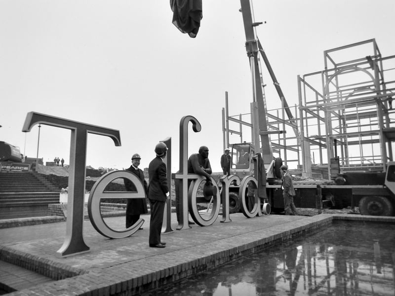 The Thomas Telford sculpture is unveiled in Civic Square, Telford, on April 8, 1988, as a crane lifts away the covering. The unveiling was carried out by Mr Bill Francis, president of the Institution of Civil Engineers, which Thomas Telford had founded. Also present is Dr T S Lin of Tatung, who had travelled from Taipei for the occasion after translating Telford’s autobiography into Chinese.