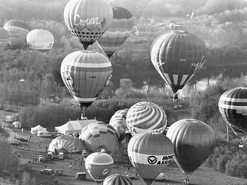 Hot air balloons take to the skies over Telford Town Park in May 1989 as around 40 balloons launch during the early morning fiesta. The display formed part of the build-up to Telford International Day, with motorists greeted by a spectacular sight as the balloons drifted overhead.