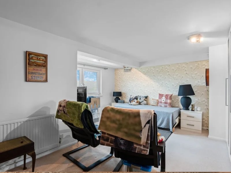 A third bedroom on the ground floor. The home has all the space ever needed for guests, home offices, playrooms and storage.