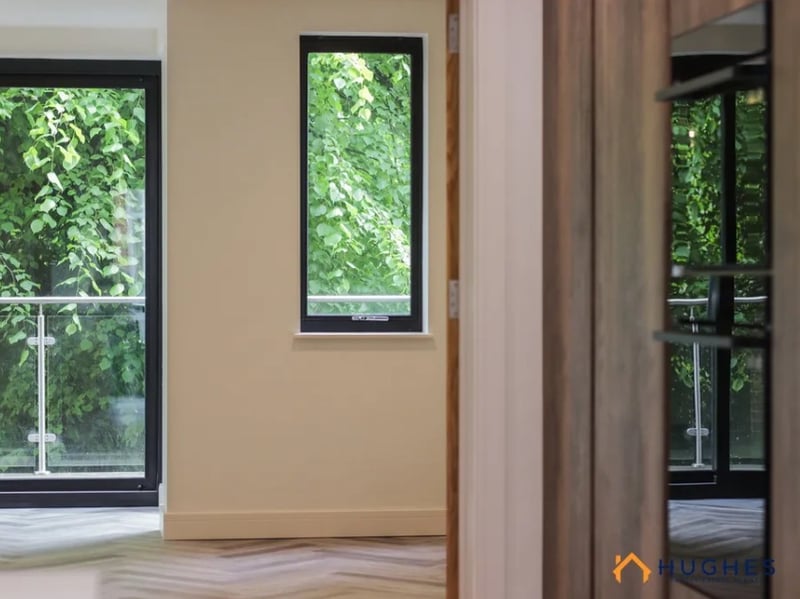 The homes are built with a view to the cemetery from almost every angle, such as this stunning long view from the kitchen.