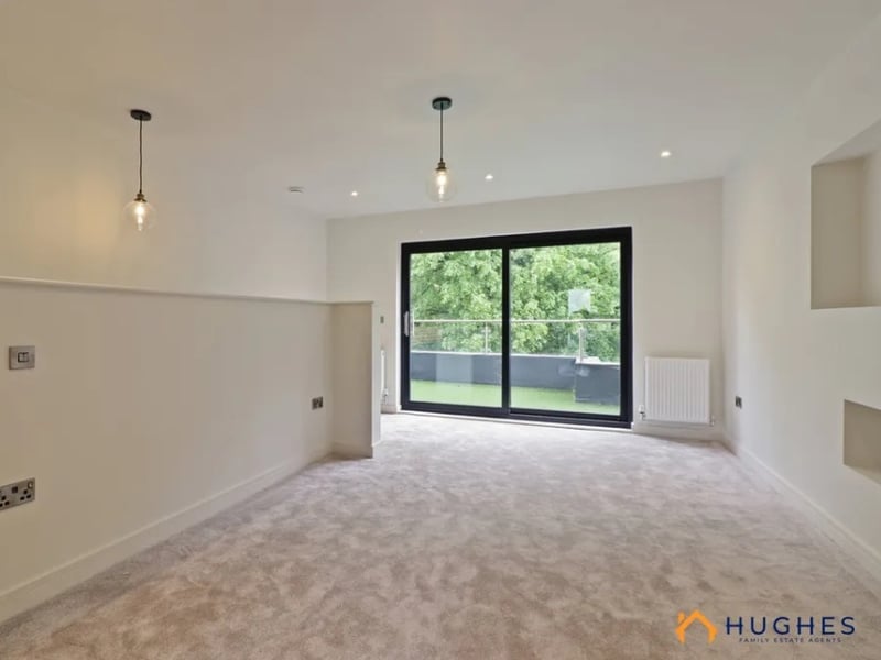 Carefully placed windows flood the home with light and will give the news owners a view to the gorgeous cemetery behind no matter where they stand.