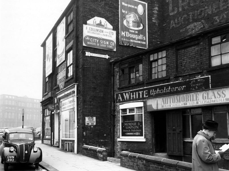 A view along the North side of Merrion Street in December 1949 showing Nos. 64 and 66. The businesses shown are The Automobile Glass Co., Mardue And Simpson (french polishers), S. Libson (tailor) and Outhwaite's newsagents.