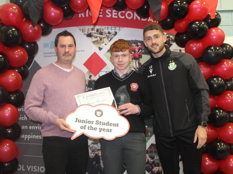 Junior Student of the Year Aaron Brennan with teacher Shane McCormack and Shamrock Rovers star Lee Grace