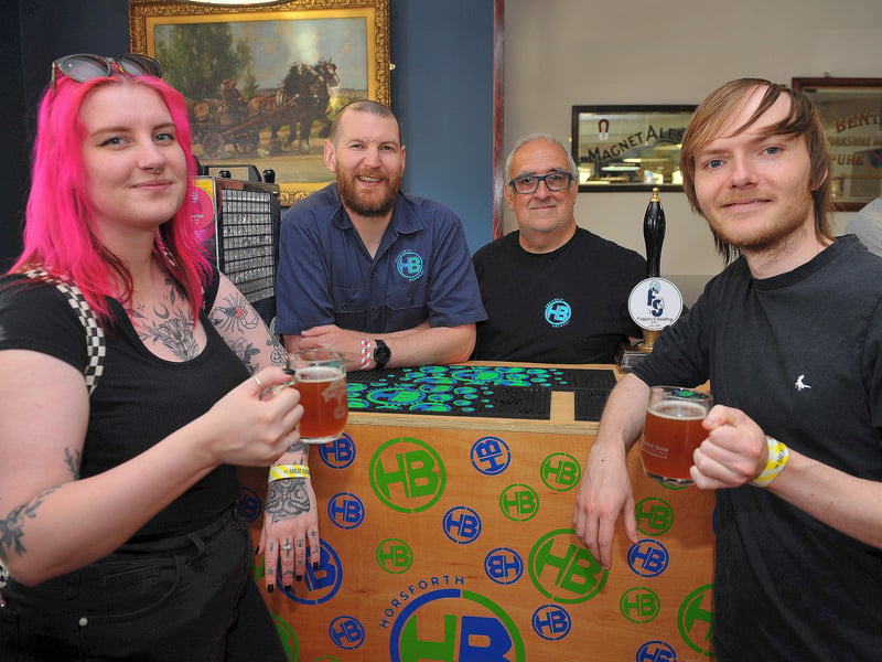 Lauren Gilbert and James Cross of The White Swan sample the Horsforth Brewery beer with Max Jefferies and Andrew Chalke from the brewery.