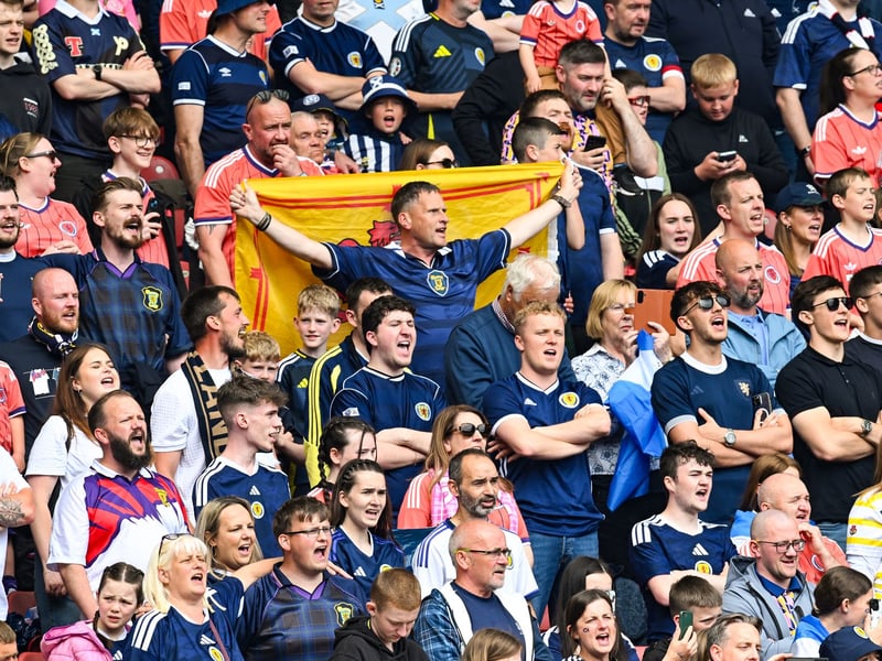 The home support belt out the national ahead of the game against Curacao.