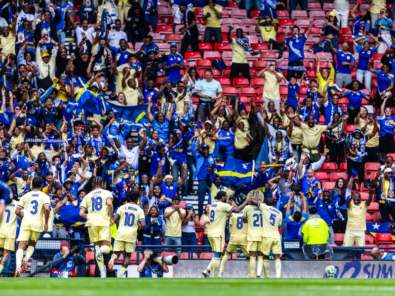 Curacao fans celebrate Tahith Chong's opener.