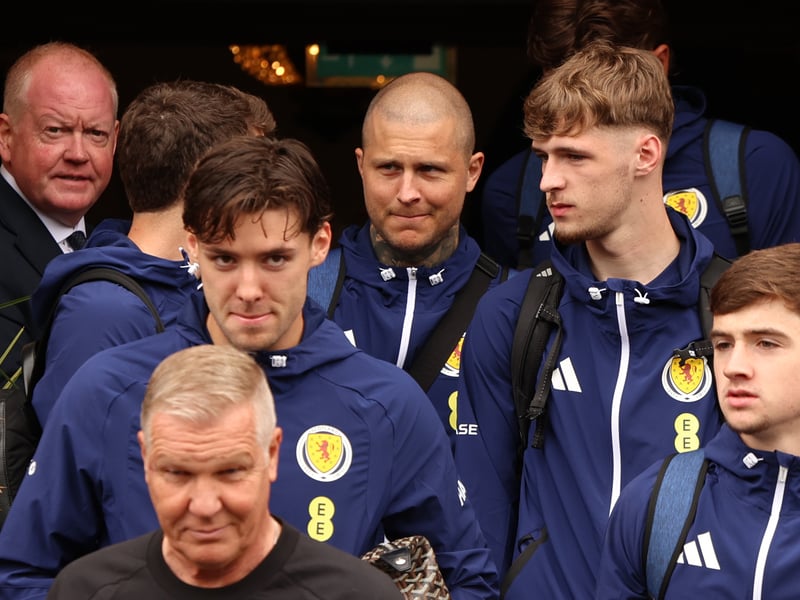 Aaron Hickey, Lyndon Dykes and late call up Tyler Fletcher (left to right) are pictured departing for Glasgow Airport from Blythswood Square Hotel.