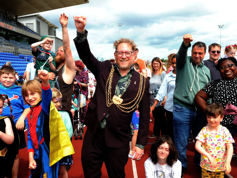 The Lord Mayor of Leeds Coun Stephen Holroyd with Super Heroes at the start of the run