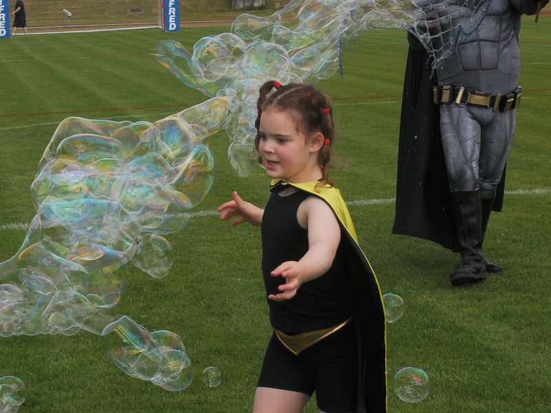 Eight-year-old Sylvie chasing bubbles before the run