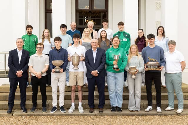 UL President Professor Shane Kilcommins with members of the championship-winning athletics team at Plassey House