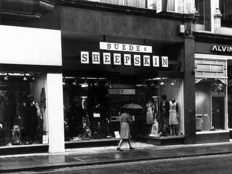 Suede and Sheepskin shop on King Edward Street pictured in May 1976. To the right is Alvin Morris Ltd., decorators' supplies showroom.