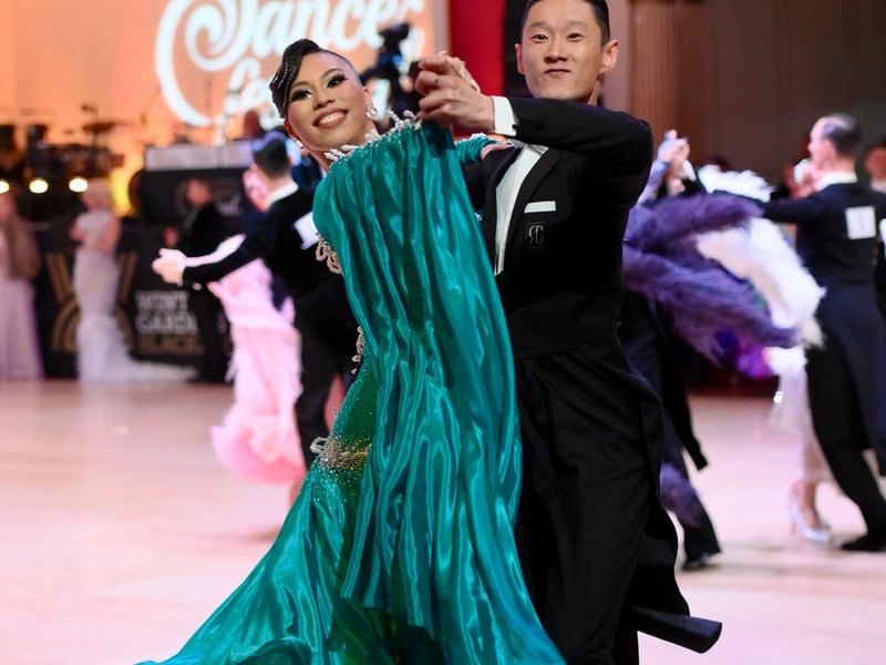 Dancers dressed in elegant ballroom attire take to the floor on the final day of the 100th Blackpool Dance Festival at the Empress Ballroom, Winter Gardens Blackpool.