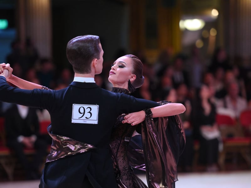 Dancers dressed in elegant ballroom attire take to the floor on the final day of the 100th Blackpool Dance Festival at the Empress Ballroom, Winter Gardens Blackpool.