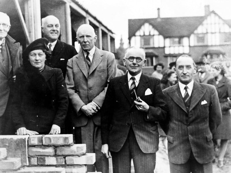 The laying of the foundation stone for the new Beacon Youth Club, Market Drayton, on April 29, 1948, with Farcroft Lodge in the background, then home of Mr Parker Bowles. The land was donated by Eustace Parker Bowles, while local headmaster and club founder Mr Llewelyn Roberts is pictured among those present. The site, on Longslow Road, is now the Beacon Community Centre.