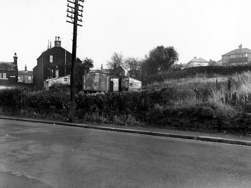 A view of Leeds and Bradford Road in November 1955. Whitecote Place is in the background.