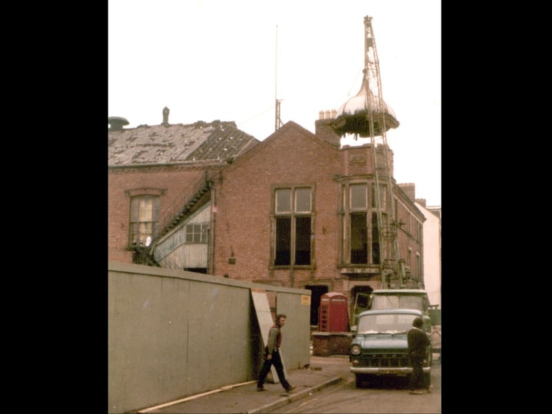 A remarkable moment in Market Drayton's history as the distinctive cupola is lifted from the roof of the Town Hall in Cheshire Street on February 21, 1972. The photograph captures the end of a familiar feature of the town skyline. The image was supplied by David Francis, who recalled the cupola being removed and suggested it may later have been sold for scrap.